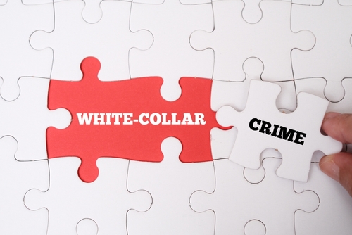 Tampa white collar crime lawyer represented through puzzle pieces labeled White Collar and Crime coming together, symbolizing complex financial crime allegations and legal defense.