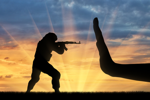 Tampa terrorism charges lawyer depicted through a silhouette of an armed figure confronted by an outstretched hand, symbolizing defense against severe federal terrorism allegations.